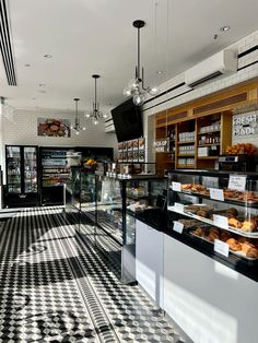 a bakery with black and white checkered flooring