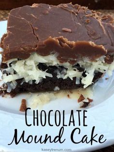 a close up of a piece of cake on a plate with the words chocolate mound cake