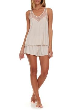 Sleep in the dreamy softness of these lace-trimmed pajamas that pair a flowy cami with matching shorts. 16" top center front length; 2 1/2" inseam; 28 1/2" leg opening; 10" front rise; 13" back rise (size Medium) Top has V-neck; adjustable straps; racerback 62% polyester, 33% rayon, 5% spandex Hand wash, dry flat Imported Short Pajamas, Flora Nikrooz, Hairstyling Products, Rollerball Perfume, Face Mist, Lace Short, Fragrance Design, Nordstrom Store, Pajama Shorts