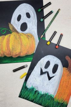 two drawings of ghost and pumpkins with crayons