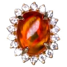 Extremely Rare Deep Red Cabochon Fire Opal Halo Diamond Engagement Wedding Ring 18K Yellow Gold. Free Domestic USPS First Class Shipping! Free Gift Bag or Box with every order! Opal—the queen of gemstones, is one of the most beautiful gemstones in the world. Every piece of opal is unique in its own ways and patterns. We only use high-quality Natural Opals (NO synthetics or imitations) for our jewelry. ----------------------------------------------------------------------------------------------- Green Play, Bracelet Love, Slim Aarons, Diamond Engagement Wedding Ring, Deco Luminaire, Opal Engagement, Opal Color, Baccarat, Engagement Anniversary