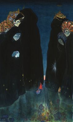 two women dressed in black standing next to each other with masks on their heads and eyes