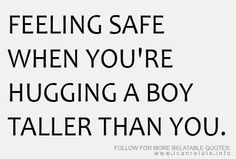 a black and white photo with the words feeling safe when you're hugging a boy taller than you