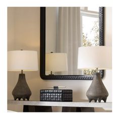 Transform your space with these bold and sophisticated accents. From the unique terracotta lamp with a rhino-inspired glaze to the sleek Valor Box crafted from topstitched black leather and the elegant ebony mango wood mirror, this collection brings texture, impact, and style to any room.

Shop the look now and elevate your living room or bedroom decor with these statement pieces!

#ShopTheLook #HomeDecorInspiration #InteriorDesign #ModernLiving #StatementPieces #TerracottaLamp #LeatherBox #MangoWoodMirror #ElegantAccents #LivingRoomStyle #BedroomDecor #LuxuryHome #SleekDesign #BoldDecor Terracotta Lamp, Lounge Lighting, Entry Tables, Arteriors Home, Coffee And Cocktail Tables, Side And End Tables, Lamp Base, Upholstered Seating, Drum Shade