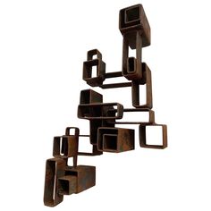 a metal sculpture with square and rectangle shapes