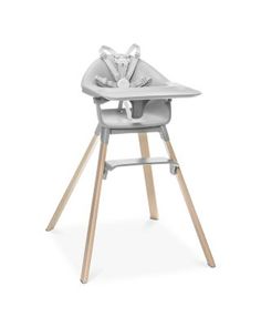 a baby high chair with wooden legs