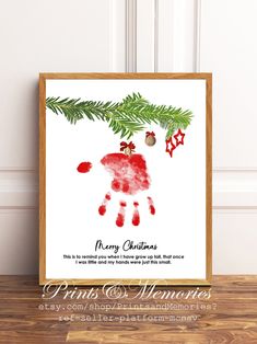 a christmas card with a handprint on it