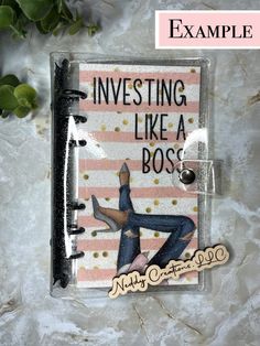 a book cover with an image of a woman laying on her stomach and the words investing like a boss