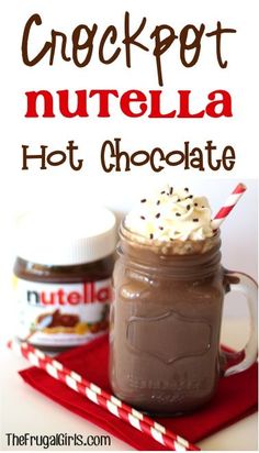 a jar of nutella hot chocolate with whipped cream and sprinkles on top