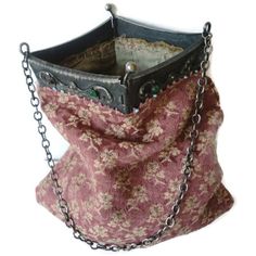 "Antique Handbag Floral Embroidered Woven Silk Brocade Double Hinged Jeweled Frame This Fabulous Antique Purse from the Early 1900's has A Gorgeous and Unusual Metal Frame The Frame is a Gunmetal Gray Color and has a Lovely Metal Repousse Swag Design that is accented with Beautiful Round Bezel Set Faceted Rhinestones in Red and Green. The Frame has a Working Metal Kisslock Closure and opens with Two Hinges that form a Wide Square Opening.  This type of purse frame is not easy to find.  In fact this is the only one I've ever seen in person in all the years I've been collecting and selling antique purses. The Body of the Purse is made of a Beautiful Pink Woven Silk Brocade that is accented with Lovely Light Pink Embroidered Stemmed Flowers that have Embroidered Turquoise Blue Centers. The Si Unusual Handbags, Victorian Purses, Swag Design, Types Of Purses, Pink Victorian, Silk Purse, Purse Frame, Frame Purse, Top Handle Bags