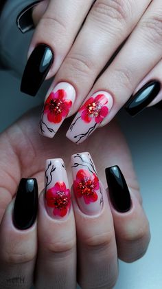 Embrace the beauty of nature with this exquisite nail design featuring vibrant red flowers blooming on a soft pink base. Accented with delicate black branches and sparkling embellishments at the flower centers, this look marries elegance and artistry. Pairing these floral beauties with sleek black nails offers a striking contrast, making this design perfect for any occasion where you want to stand out!
#winternails #floralnails #acrylicnails #nailsideas #nailsdesign