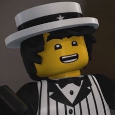 a lego man wearing a top hat and vest