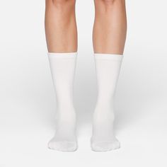 A crew length sock that’s smooth, ultra-soft, and breathable with a polished feel. White Crew Socks Women, White Sweat-resistant Athleisure Socks, White Mid-calf Cotton Socks, White Moisture-wicking Sporty Socks, Ribbed Cotton Mid-calf Socks, Soft Sock, Crew Sock, Knee High Sock, Cool Socks