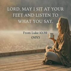 a woman sitting on a dock holding a coffee cup with the words, lord may sit at your feet and listen to what you say