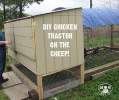 a man standing next to a chicken coop