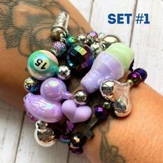 Meaningful cute fancy and fun beads bracelets. Set of 4. Positive vibes for empowered women. Trendy Purple Beaded Bracelets For Party, Fun Beaded Bracelets For Friendship, Trendy Charm Bracelet For Friendship With Colorful Beads, Trendy Colorful Beads Charm Bracelet For Friendship, Funky Beaded Bracelets For Gifts, Trendy Round Beaded Charm Bracelet For Friendship, Trendy Purple Beaded Bracelets, Fun Round Beads Bracelets For Party, Trendy Adjustable Purple Charm Bracelet