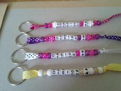 four lanyards with different designs on them