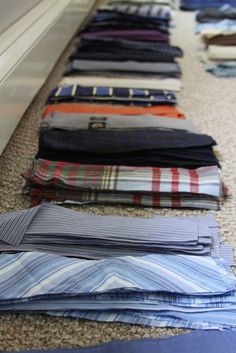 there are many ties laid out on the floor