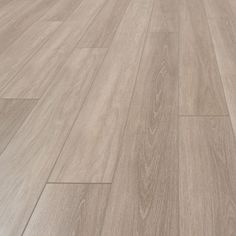 an image of wood flooring that looks like it has been painted in light brown