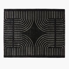 a black and white rug with lines on it