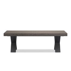 the table is made from concrete and has black legs