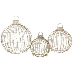 three metal ball ornaments with wire wrapped around the top, one in gold and one in white