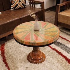 a living room with couches, chairs and a table on the carpeted floor