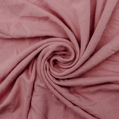 a close up view of a pink fabric