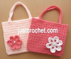 two crocheted bags with flowers on them