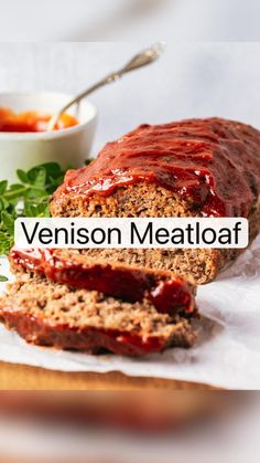 the meatloaf is sliced and ready to be eaten with sauces on the side