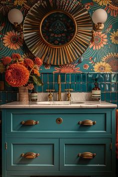 a bathroom vanity with flowers on the counter