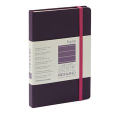 a purple and white notebook with pink ribbon