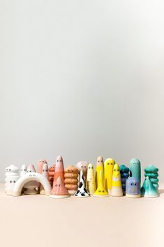 there are many small toy animals lined up together