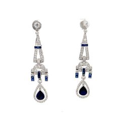 Art Deco Sapphire and Diamond Dangle Earrings in 18K White Gold. The earrings feature near colorless round diamonds, pear shape and square cut sapphires. Comes with GIA report. 2.75" Length12.6 Grams Diamond Dangle Earrings, Square Cut, Sapphire Diamond, Pear Shape, Pear Shaped, Round Diamonds, Diamond Earrings, Pear, Sapphire