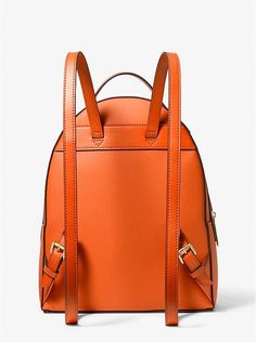 From gym sessions to city commutes, our Sheila backpack has you covered. The faux Saffiano leather style comes with a dedicated pocket inside for your table, as well as a front zip pouch for smaller items. Adjust the buckled leather straps on the back for the perfect drop..• Backpack.• Faux Saffiano leather.• 88.92% coated canvas/11.08% polyester.• Gold-tone hardware.• 9.5”W X 12.25”H X 5”D.• Handle drop: 1.5”.• Exterior details: front zip pocket.• Interior details: back zip pocket, 3 slip pocke Casual Michael Kors Backpack With Adjustable Strap, Michael Kors Everyday Leather Backpack With Adjustable Strap, Michael Kors Backpack For On-the-go, Michael Kors Casual Backpack For Everyday Use, Michael Kors Leather Backpack With Zipper Closure, Michael Kors Leather Backpack For Everyday, Michael Kors Casual Backpack With Zipper Closure, Casual Michael Kors Backpack For Everyday Use, Michael Kors Leather Backpack With Zipper