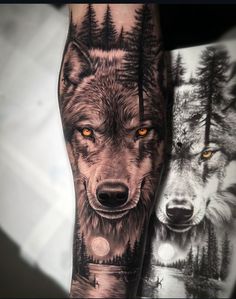 an arm tattoo with two wolfs and trees on the back of it, in black and grey colors