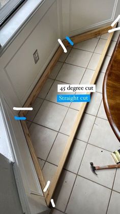 the corner of a kitchen counter is shown with blue tape around it and there are arrows pointing