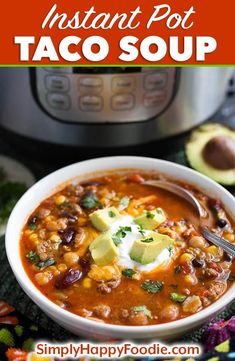 instant pot taco soup in a bowl with avocado and sour cream