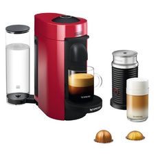 a red coffee maker sitting on top of a counter next to some cups and containers