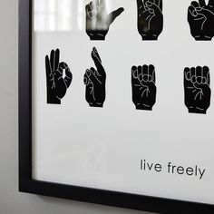 a black and white poster with five fingers in different languages that say, live freely