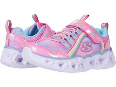 PRICES MAY VARY. Hook and loop strap with on/off light switch Toddler sizes do not feature light switch Shimmery ombre fabric and smooth synthetic upper Slip-on style in a bungee-laced panel Cushioned midsole with 3-D sculpted light-up hearts Flexible traction outsole Rainbow Sneakers, Ombre Fabric, Light Up Sneakers, Skechers Kids, Heart Lights, Girls Shoes Kids, Shoes Pink, Kids Luggage, Elastic Laces