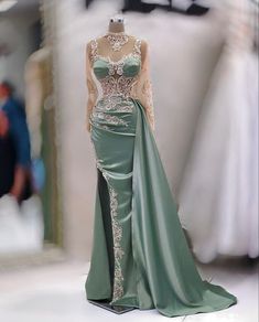 Green Sweep Train Dress For Prom Season, Long Sleeve Dresses For Wedding And Prom Season, Green Long Sleeve Dress For Banquet, Green Gown With Sweep Train, Green Sweep Train Gown, Green Long Dress For Banquet, Green Dresses With Sweep Train For Banquet, Green Dress With Sweep Train For Banquet, Long Train Dress For Banquet And Prom Season