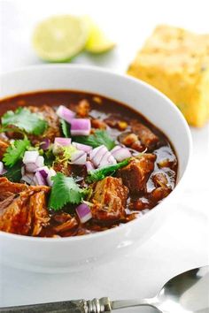 a close up of a bowl of food on a table