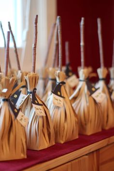 several bags with tags tied to them sitting on a table