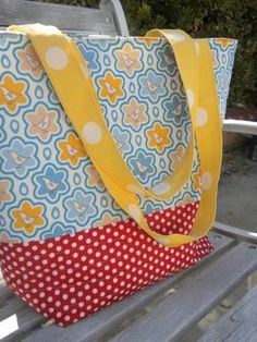 a bag sitting on top of a wooden bench