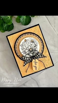 a close up of a card with flowers on it