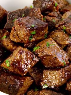 garlic butter steak bites in a white bowl