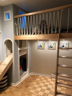 there is a loft bed with stairs in the room