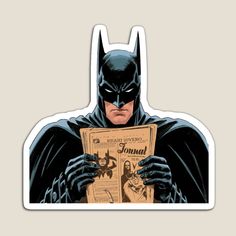 batman reading the newspaper with his hands