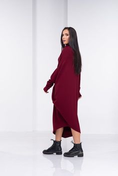 Sweater Dress, Wool Dress, Long Sleeve DressThis extravagant and designer sweater dress has two an asymmetric design, turtleneck and long sleeves. Warm and cozy a fabulous piece for the new season.The model in the picture is 168cm. ⅼ 5.6 ft. tall and is wearing size S / color: Burgundy🌟 INFO:• Worldwide EXPRESS shipping – please provide a phone number for shipping documents• US Sizing XS to 4XL – body size chart available below• We offer customization to Personal Measurements & Larger Sizes Chic Sweater With Asymmetrical Hem For Winter, Casual Asymmetrical Midi Dress For Fall, Casual Asymmetrical Dress For Fall, Elegant Asymmetrical Sweater For Winter, Chic Asymmetrical Long Sleeve Dress For Fall, Winter Turtleneck Oversized Dress, Winter Asymmetrical Oversized Sweater, Oversized Asymmetrical Winter Sweater, Oversized Dresses With Asymmetrical Hem For Fall